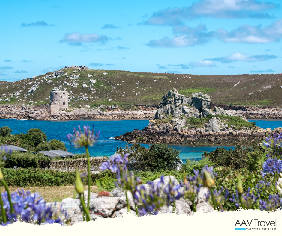 Castle ruins overlooking the sparkling coastline on the Isle of Scilly